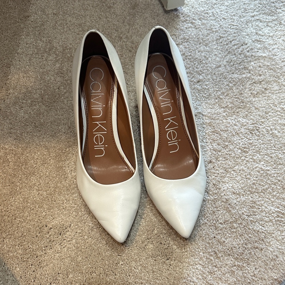 Calvin Klein white pumps